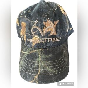 Real Tree-Logo ball cap. Gray, tan, green camo. One size velcro back. NWOT